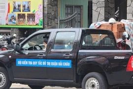 Đình chỉ công tác cán bộ giúp dân nhận nộp phạt qua tài khoản