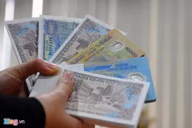 Cấm sử dụng trái phép hình ảnh tiền Việt Nam làm bao lì xì