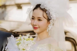 Midu khoe ảnh mặc váy cưới đẹp lung linh, nửa kia chưa lộ diện