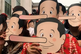 'Chiêu trò' mua phiếu của chính phủ quân sự Thái Lan trước kỳ bầu cử