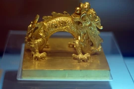 Cổ vật “rồng khênh kiệu Mặt Trời” nhà Nguyễn 