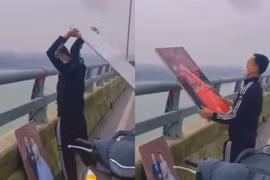 Người đàn ông vứt ảnh cưới xuống sông gây xôn xao