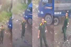 Xác định quân nhân rút súng chĩa về tài xế xe container