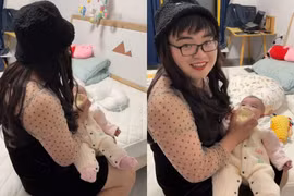 "Ông bố của năm" đội tóc giả, mặc váy thay vợ chăm con