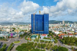 Một doanh nghiệp đổi tài sản đảm bảo trái phiếu là cổ phiếu và BĐS 