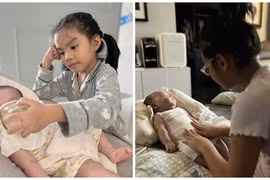 Phạm Quỳnh Anh khoe hai con gái chăm sóc em nhỏ