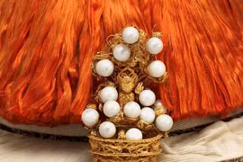 Vì sao trên vương miện Hoàng đế nhà Thanh có hình tượng Phật?