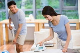 Hải Nam (Trung Quốc) vận động nam giới chia sẻ việc nhà với vợ