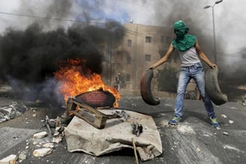 Đụng độ đẫm máu Palestine-Israel qua ảnh 