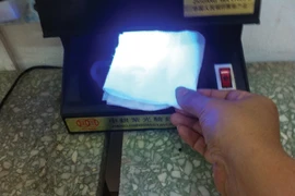 Giấy tái chế chứa chất tăng trắng cao