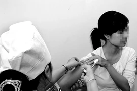 Đang tiêm văcxin ngừa bệnh thì có thai