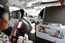 Nhiều tài xế ôm nợ, tính bỏ nghề vì “vỡ mộng” Uber, Grab