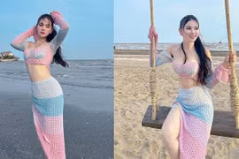 "Mẹ 2 con" Thu Thủy kín đáo đi biển vẫn gợi cảm hút mắt