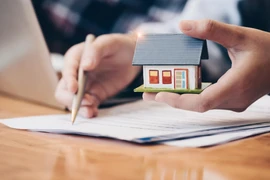 Thay-doi-quy-dinh-bao-lanh-vay-mua-nha-tren-giay