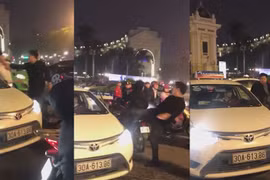 Video: Va chạm nhẹ, tài xế Mercedes liên tục đấm đá rồi đạp bay gương taxi