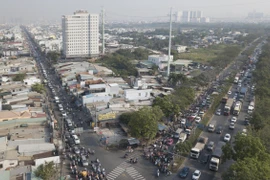 Quốc lộ 50 giao đường Nguyễn Văn Linh. Ảnh: Zing