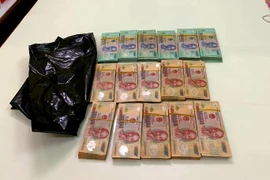 Cơ quan điều tra phát hiện 16 tập tiền trong phòng làm việc của vị Thẩm phán