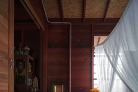 Nhà sàn gỗ giữa rừng dừa thân thiện với môi trường thiên nhiên