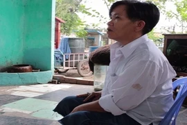 Kỳ lạ người đàn bà hơn 35 năm sống bằng nghề canh gác mộ