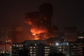 Ảnh thế giới 7 ngày qua: Tên lửa phát nổ trên bầu trời Kiev 