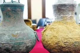 Tìm được bình cổ TQ có thể chứa rượu quý tộc 2.000 năm tuổi
