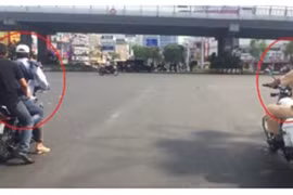 Video: Xe máy kẹp ba không mũ bảo hiểm "lặng lẽ" lùi sau xe CSGT