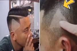 Vì nhỡ mồm, thanh niên 'chất chơi' mang cả cái nút play to tướng trên đầu