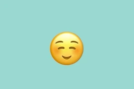 Nụ cười ẩn dưới emoji mang khẩu trang của Apple