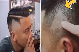 Thanh niên 'chất chơi' mang cả cái nút play to tướng trên đầu