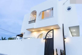 Cặp vợ chồng bỏ phố về quê xây ngôi nhà đầy nắng và gió 