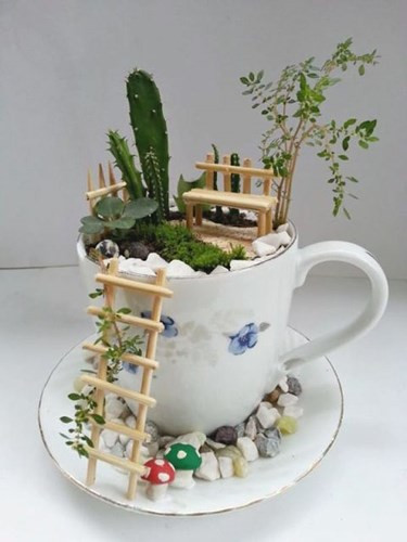 Tách trà tái hiện sinh động khu vực nghỉ ngơi, hóng mát.
