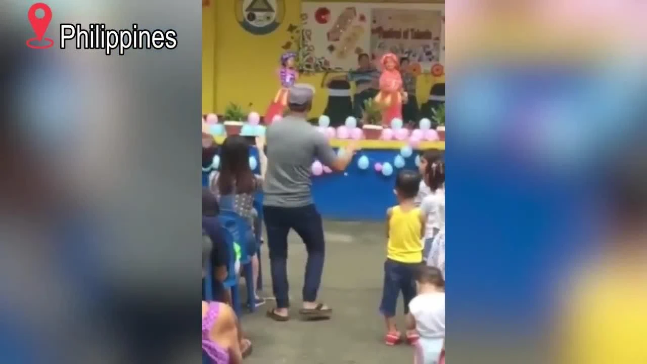 Video: Đứng cổ vũ con gái, bố không quên múa dẻo “nhắc bài“