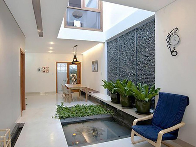 Thiết kế nhà ống có giếng trời đẹp hút ánh sáng mặt trời - Hình 6 Thiet ke nha ong co gieng troi dep hut anh sang mat troi-Hinh-6