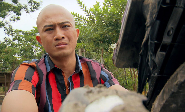 Hai hình ảnh đối lập của Doãn Quốc Đam - Hình 5 Hai hinh anh doi lap cua Doan Quoc Dam-Hinh-5