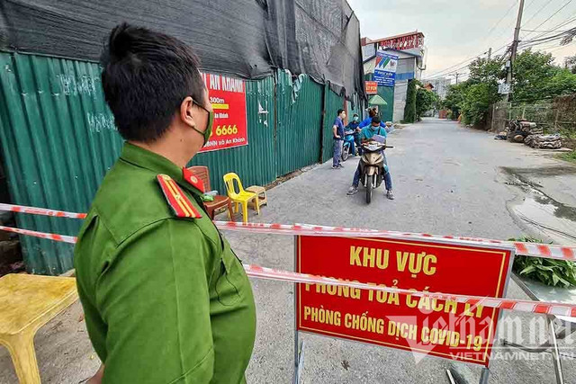 Dựng tường gạch, lập 14 chốt quanh xã có 6 ca mắc Covid-19 - Hình 2 Dung tuong gach, lap 14 chot quanh xa co 6 ca mac Covid-19-Hinh-2