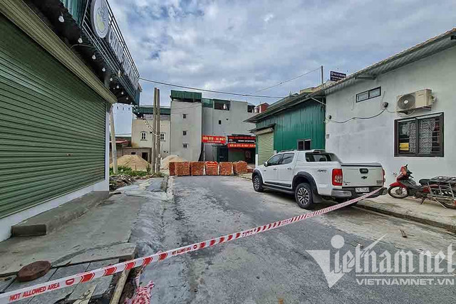 Dựng tường gạch, lập 14 chốt quanh xã có 6 ca mắc Covid-19 - Hình 3 Dung tuong gach, lap 14 chot quanh xa co 6 ca mac Covid-19-Hinh-3