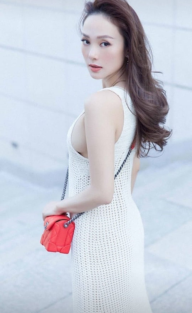 BST đầm trắng gây thương nhớ của Minh Hằng từ đời thường đến sự kiện - Hình 3 BST dam trang gay thuong nho cua Minh Hang tu doi thuong den su kien-Hinh-3