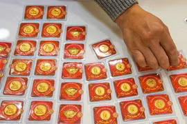 Vàng SJC và DOJI giảm 400.000 đồng/lượng chiều 4/7