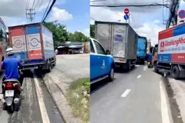 Lấn làn, vượt ẩu: Video xe tải leo vỉa hè ở TP HCM gây phẫn nộ