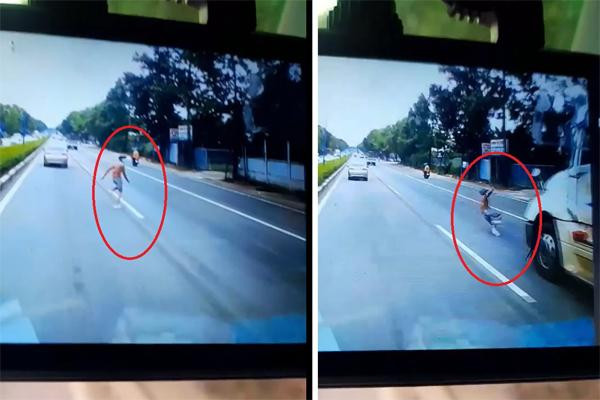 Video: Thanh niên chạy sang đường ngã vào gầm xe container Video: Thanh nien chay sang duong nga vao gam xe container