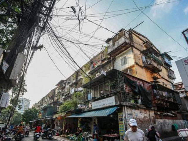 Cuộc sống tại những căn nhà ổ chuột giữa lòng Hà Nội - Hình 18 Cuoc song tai nhung can nha o chuot giua long Ha Noi-Hinh-18