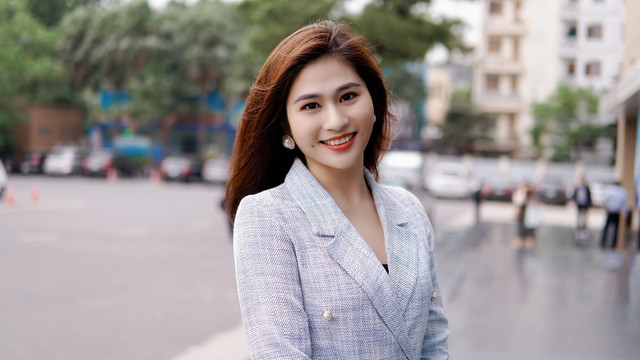 Vẻ đẹp mặn mà của BTV Minh Trang thời sự 19h - Hình 2 Ve dep man ma cua BTV Minh Trang thoi su 19h-Hinh-2
