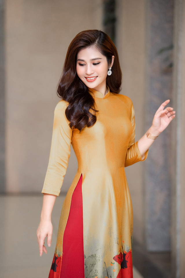 Vẻ đẹp mặn mà của BTV Minh Trang thời sự 19h - Hình 12 Ve dep man ma cua BTV Minh Trang thoi su 19h-Hinh-12