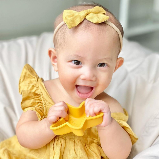 Tan chảy nụ cười "hoa hậu" của con gái Hồ Ngọc Hà - Hình 3 Tan chay nu cuoi