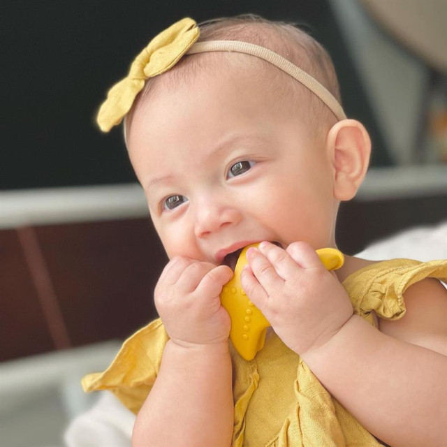 Tan chảy nụ cười "hoa hậu" của con gái Hồ Ngọc Hà - Hình 2 Tan chay nu cuoi
