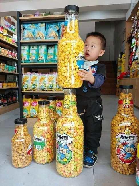 Chai bỏng ngô siêu to khổng lồ hút khách, shop bán 500 chai mỗi tháng - Hình 3 Chai bong ngo sieu to khong lo hut khach, shop ban 500 chai moi thang-Hinh-3