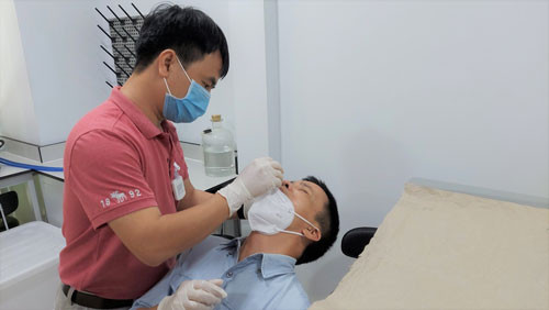 Cách sử dụng kit test SARS-CoV-2 tại nhà - Hình 3 Cach su dung kit test SARS-CoV-2 tai nha-Hinh-3