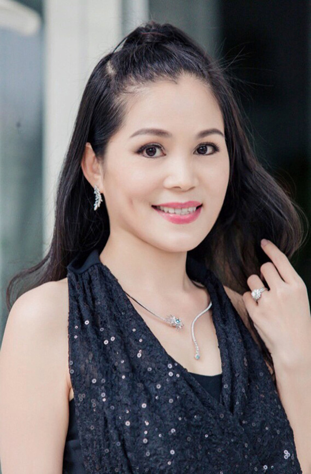 Nhan sắc và nỗi cơ cực thời trẻ của bà xã MC Quyền Linh - Hình 9 Nhan sac va noi co cuc thoi tre cua ba xa MC Quyen Linh-Hinh-9