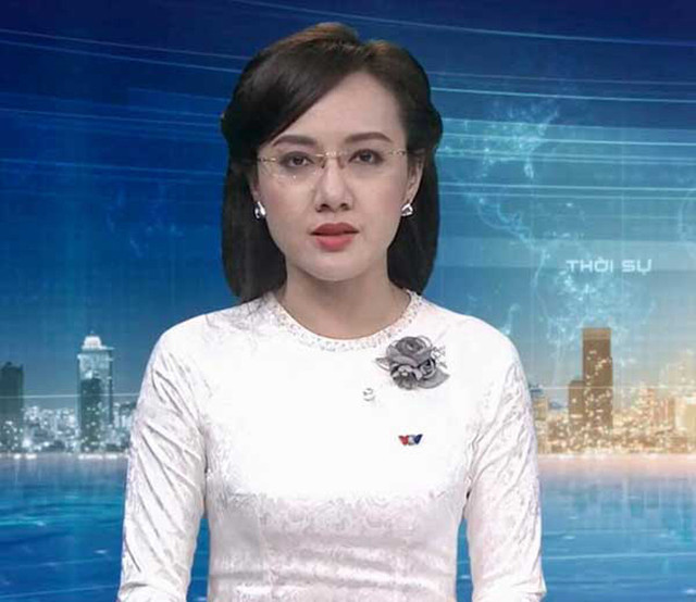 BTV Thời sự Hoài Anh bao năm gắn với chiếc áo dài - Hình 5 BTV Thoi su Hoai Anh bao nam gan voi chiec ao dai-Hinh-5