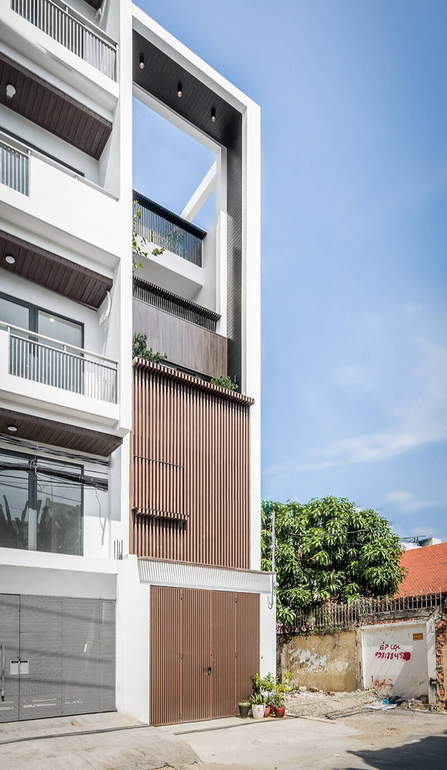 Giải pháp đưa nắng gió vào nhà 90m2, mặt tiền như tấm rèm cản bụi Giai phap dua nang gio vao nha 90m2, mat tien nhu tam rem can bui